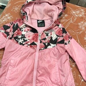 Worn Nike windbreaker size 6, girls